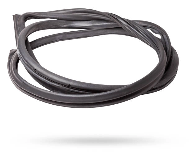 A coiled rubber weather seal for a garage door. -garage door seal